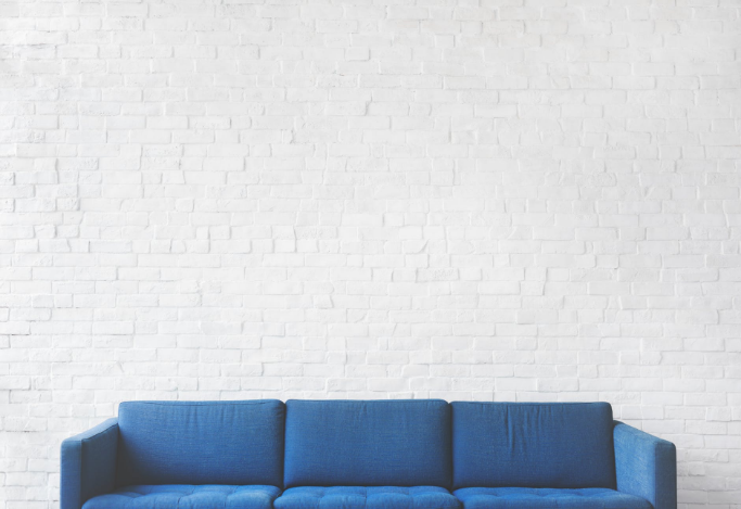 a blue couch in a room